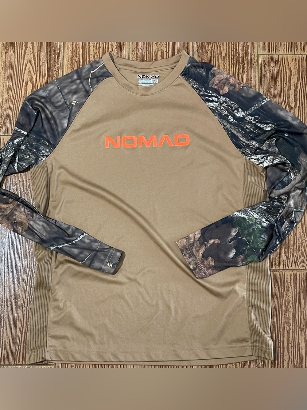 Nomad Long Sleeve Performance Shirt - Tan Body with Camo Sleeves and Orange Logo
